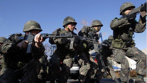 South Korean soldiers participate in an anti-chemical and anti-biological terror drill on November 18, 2013 in Seoul, South Korea