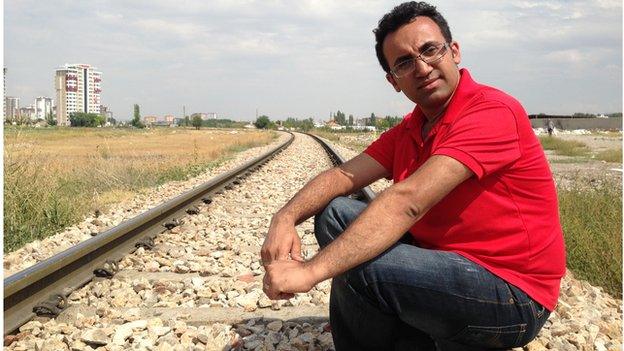 Arsham Parsi on train tracks in Turkey