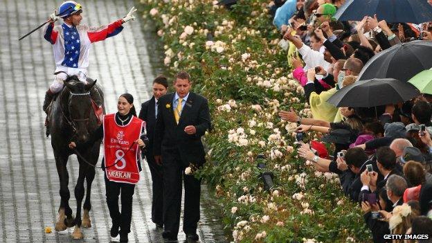 Gerald Mosse celebrates after winning the Melbourne Cup riding Americain - 2 November 2010