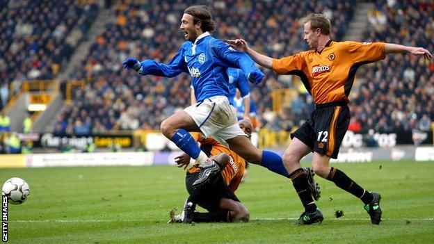 Blues striker Christophe Dugarry tangles with Wolves defender Jody Craddock, Molineux (November 2003)