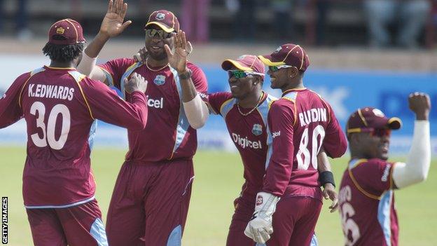 West Indies one-day captain Dwayne Bravo (second left) leads celebrations