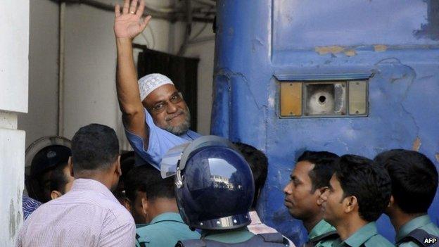 Mir Quasem Ali enters a van at the International Crimes Tribunal court in Dhaka, Bangladesh on 2 November 2014