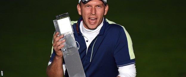 Marcel Siem with the BMW Masters trophy