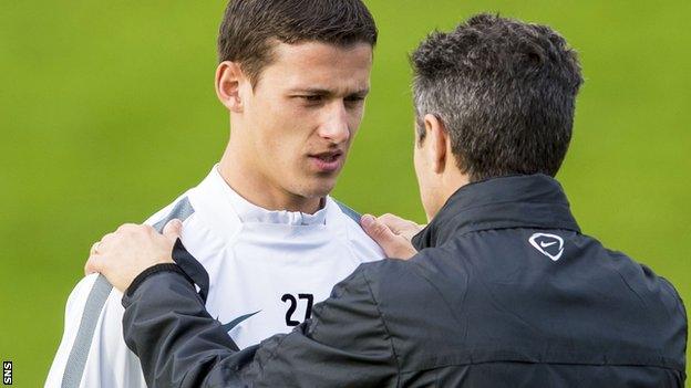 Celtic midfielder Aleksandar Tonev and assistant manager John Collins