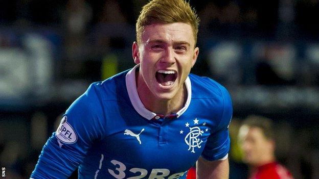 Midfielder Lewis Macleod celebrates with Rangers