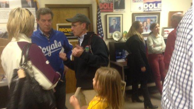 Sam Brownback listens to voters