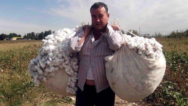 People from all walks of life are drafted in like this medical worker from the Tashkent area