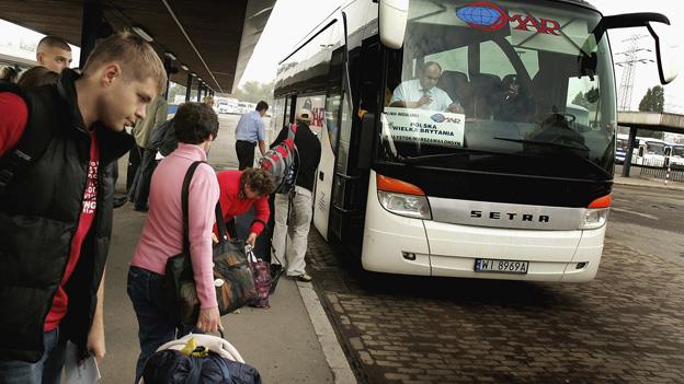 Polish workers at Warsaw bus garage - file pic