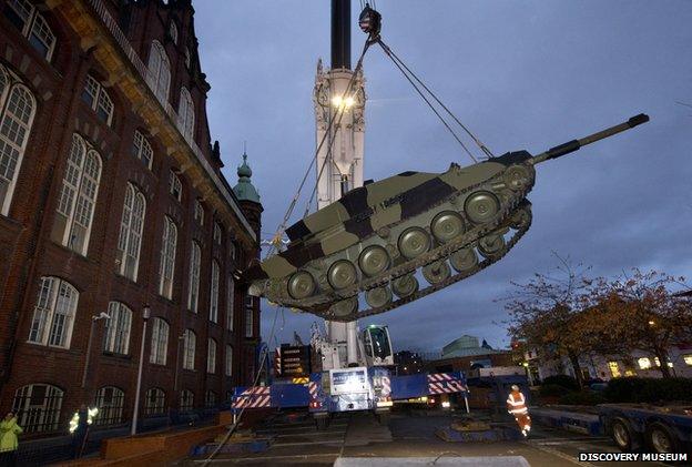 The tank is lowered into place