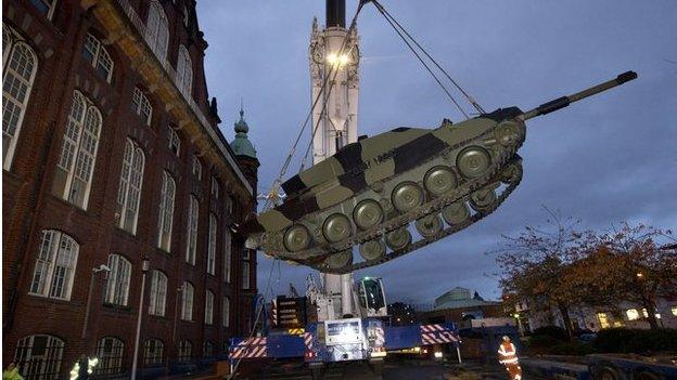 The tank is lowered into place