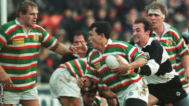 Tigers wing Rory Underwood scampers away with the ball during the 1995 game against the Baa-Baas