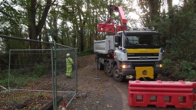 Barriers have been put in place to prevent access to the new road