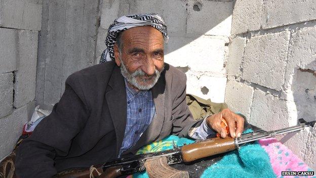 Xelîl Osman, 67. is fighting with his two sons against IS militants (October 2014)