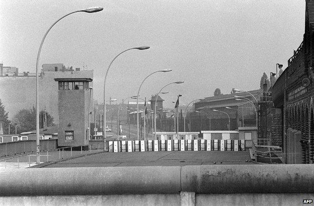 A watchtower on a bridge on the Spree river, marking the border between East and West Berlin