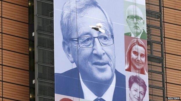 An image of the European Commission's new President Jean-Claude Juncker, on the facade of the European Commission headquarters in Brussels (4 November 2014)