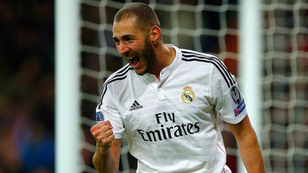 Karim Benzema scores Real Madrid's opener against Liverpool