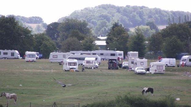 Travellers in a field