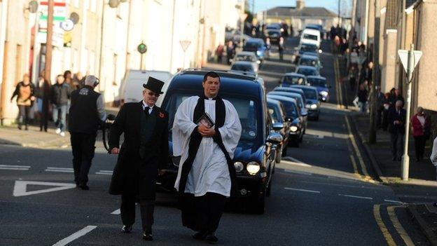 The Reverend Steve Bunting leaves the funeral