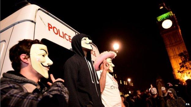 Members of activist group Anonymous during a protest in Parliament Square