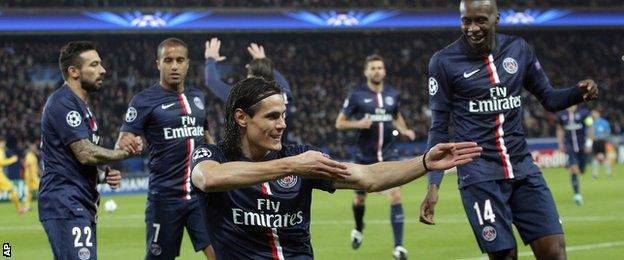 Edinson Cavani celebrates scoring for Paris St-Germain against Apoel Nicosia