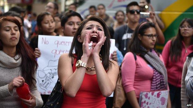 Relatives of the 43 trainee teachers protest