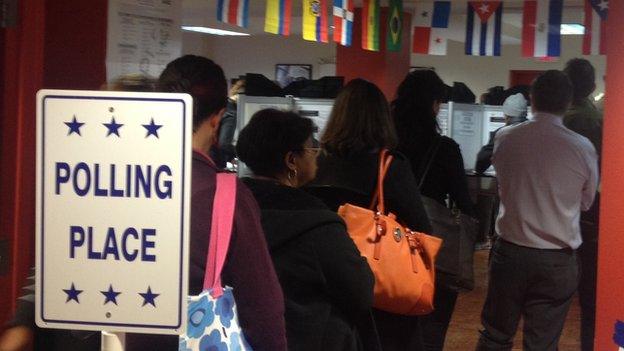 Voters queuing to vote