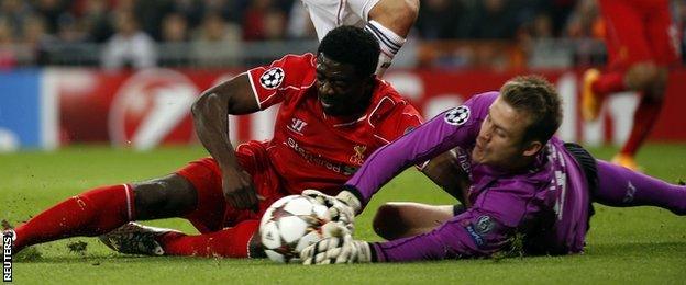 Kolo Toure and Simon Mignolet