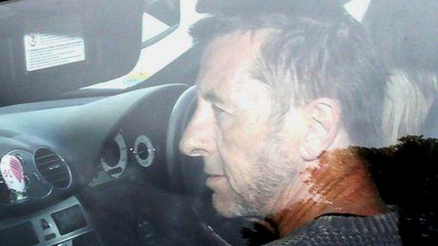 Phil Rudd leaving court