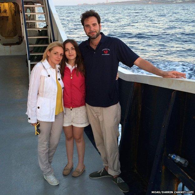 Regina and Christopher Catrambone with their daughter