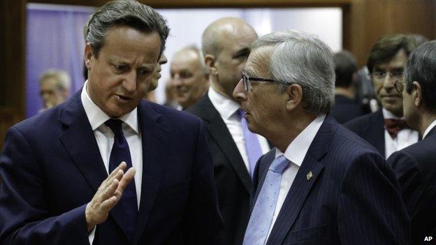 David Cameron and Jean Claude-Juncker speaking at a conference