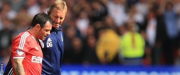 An injured Andy Reid walks off the pitch after being hurt in the game against Derby County in September