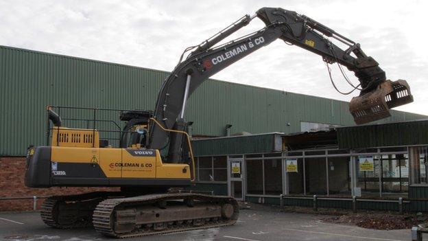 A digger at the Greencore site in Moulton Park