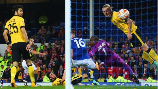 Everton midfielder Russell Osman scores against Lille in the Europa League