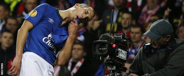 Leon Osman celebrates scoring Everton's first goal against Lille in the Europa League