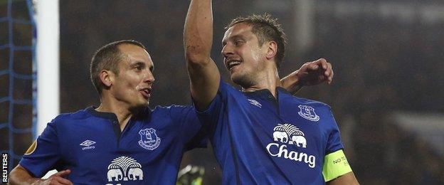 Phil Jagielka celebrates scoring Everton's second goal in a 3-0 win over Lille in the Europa League