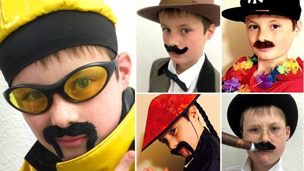 William Heath dressed as moustachioed celebrities