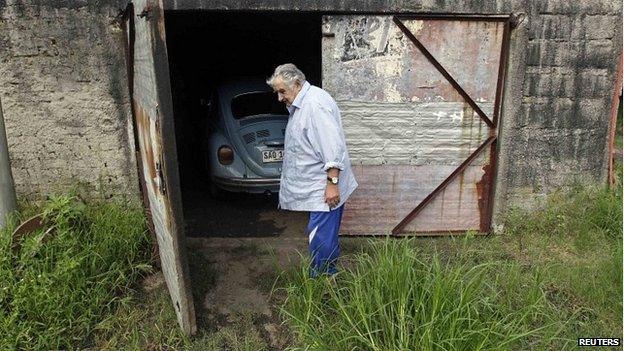 President Mujica opens the door of his garage on his farm on the outskirts of Montevideo - 13 February 2014