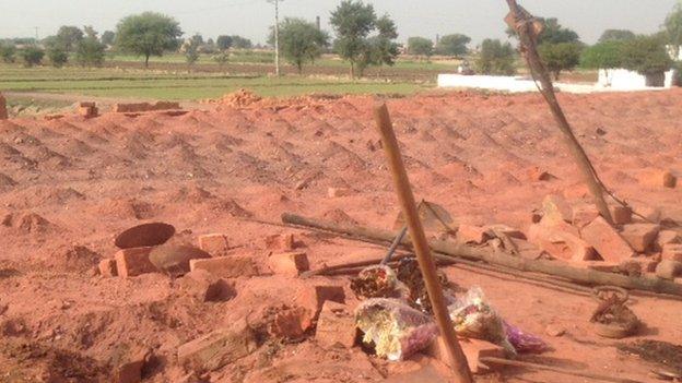 Flowers at the site of the couple's lynching in Pakistan, November 2014