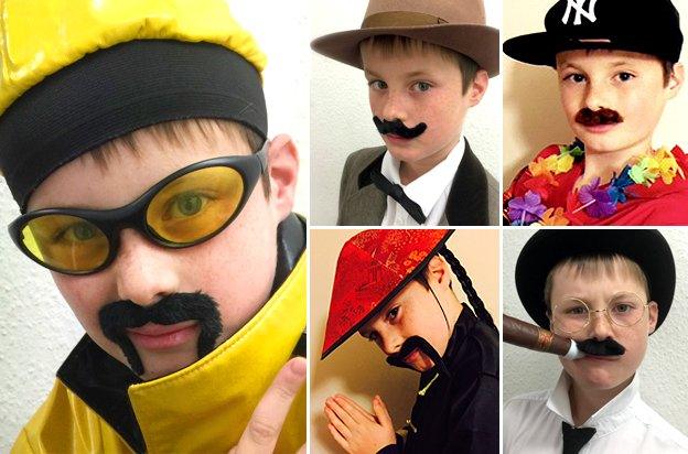 William Heath dressed as moustachioed celebrities