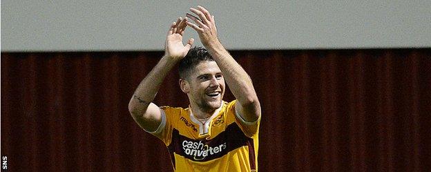 Motherwell midfielder Iain Vigurs celebrates