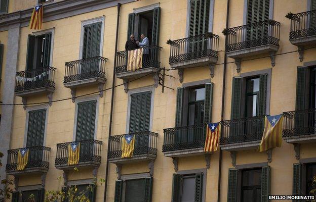 Balconies are decorated with "estelada" or pro independence flags ahead of voting on an informal poll, scheduled for next Sunday, in Girona, Spain, on Saturday Nov. 8, 2014