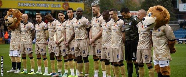 Millwall observe the minute's silence before kick-off