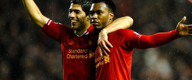 Daniel Sturridge (right) is congratulated by former teammate Luis Suarez after scoring a goal