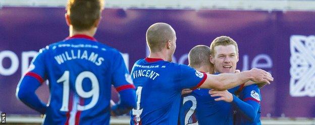 Billy McKay celebrates as he draws Caley Thistle level