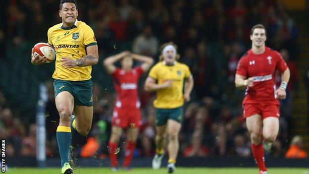 Israel Folau runs clear to score against Wales