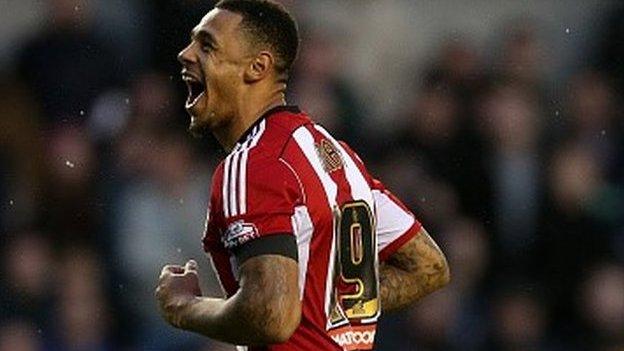 Andre Gray celebrates