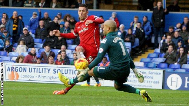 Birmingham goalkeeper Darren Rudolph saves from Adam Le Fondre