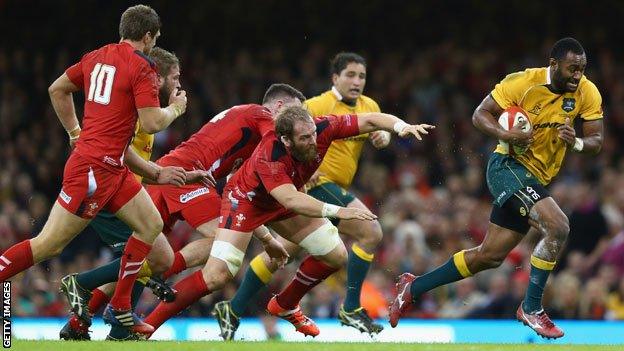 Tevita Kuridrani breaks through the Welsh defence to score