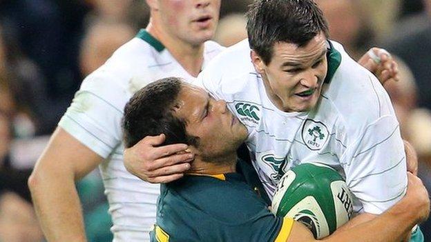 South African centre Jan Serfontein tries to halt man of the match Jonathan Sexton at the Aviva Stadium