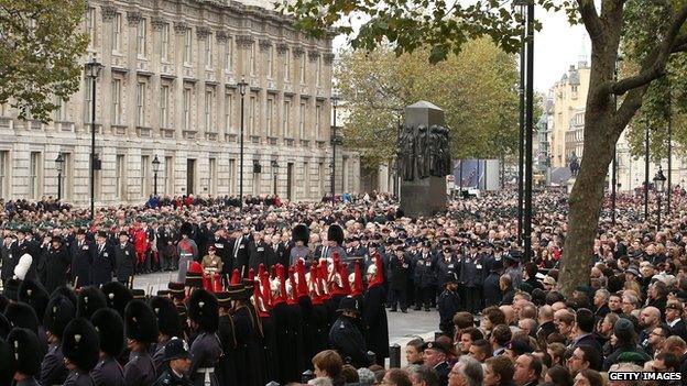 Crowds, armed forces personnel and dignitaries at the Cenotaph on Remembrance Sunday